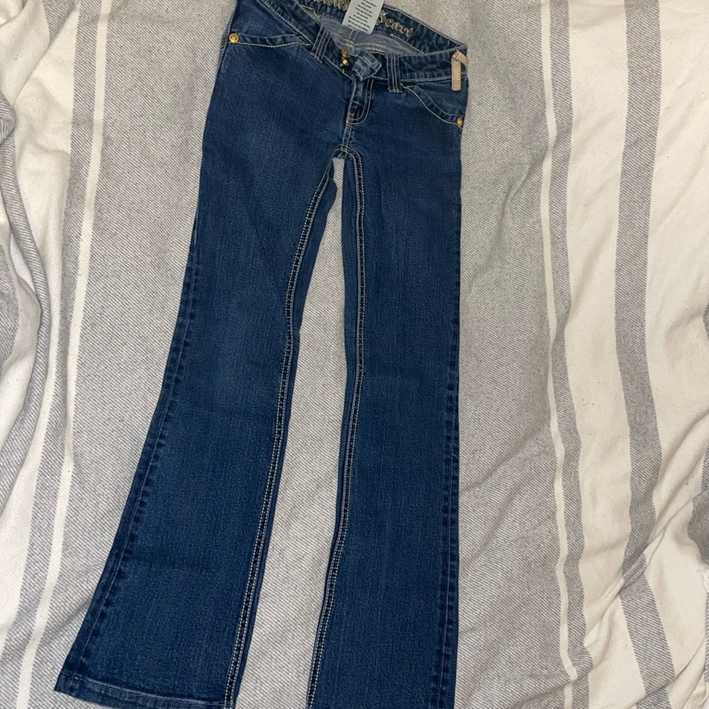 Twisted heart Jeans. Size 24